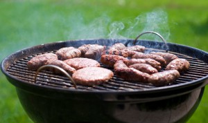 Hot dogs and hamburgers on a grill